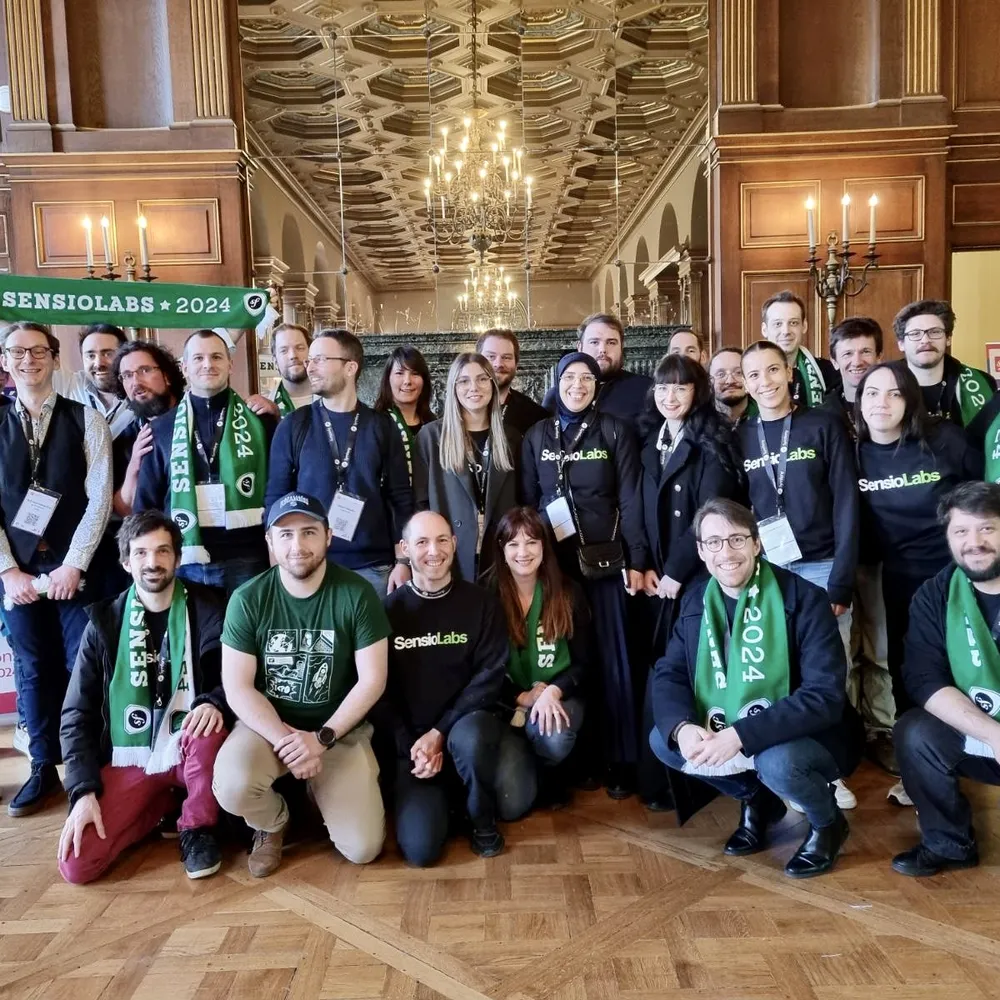 The SensioLabs team with greens scarves